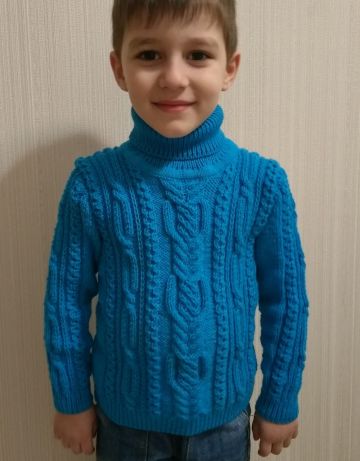 Maglione con trecce per bambino