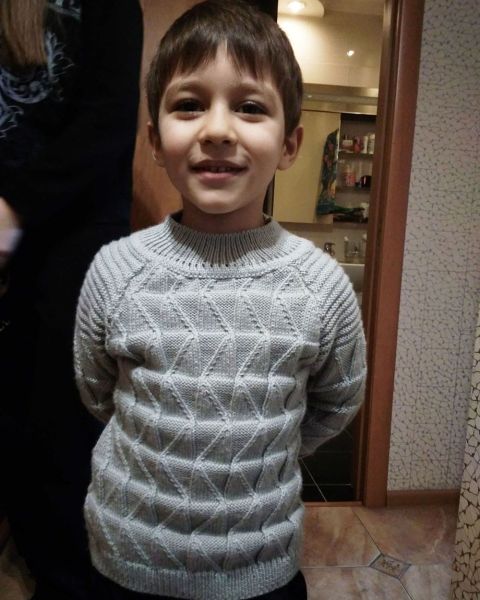 Set per un bambino: cappello e pullover