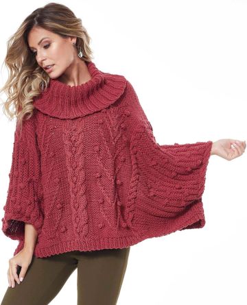 Maglione-poncho con una treccia centrale