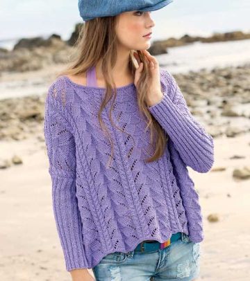 Pull con una combinazione di punto ajour e di punto treccia