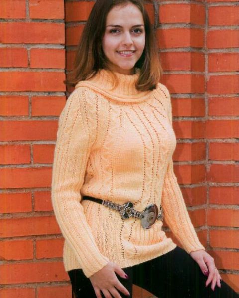 Maglione lungo con trecce
