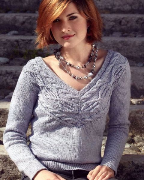 Pullover con una piazza di rombi