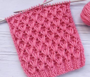 Punto Rombi con le maglie allungate ai ferri
